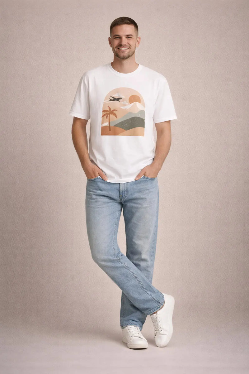 Retro sunset travel t-shirt featuring palm tree, plane, and mountain graphic by Printify on a male model.